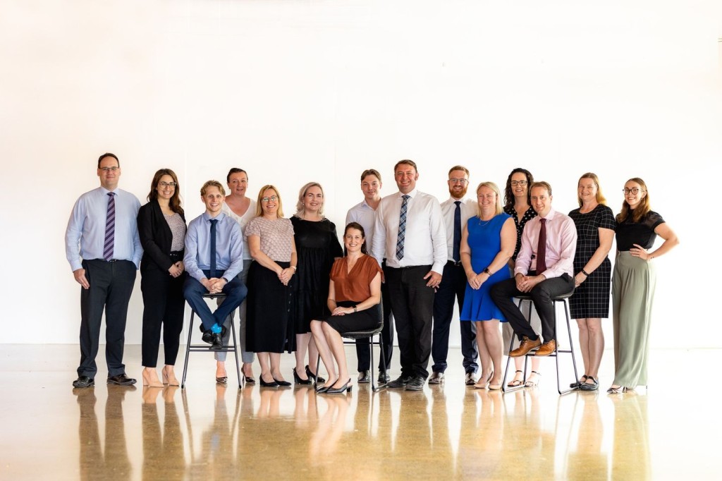 Melody and Andrew with their Purcell Taylor Lawyers team